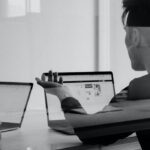 A diverse team of creative professionals collaborating on a content marketing strategy, emphasizing the importance of content marketing for agency success.